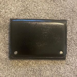 silver chain black bag